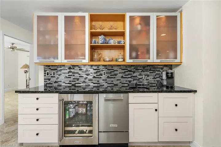 Wet Bar has wine/drink cooler and large ice machine.
