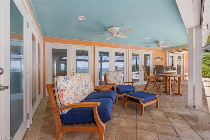Enjoy relaxing in this large lanai with roll down shutters.