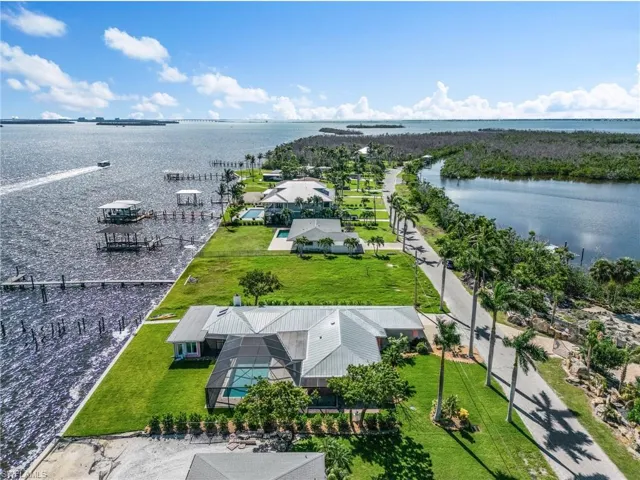 Aerial view of home looking south to the Gulf of Mexico!  Imagine being there in less than 10 minutes fishing in some of the best fishing in all of SW Florida!