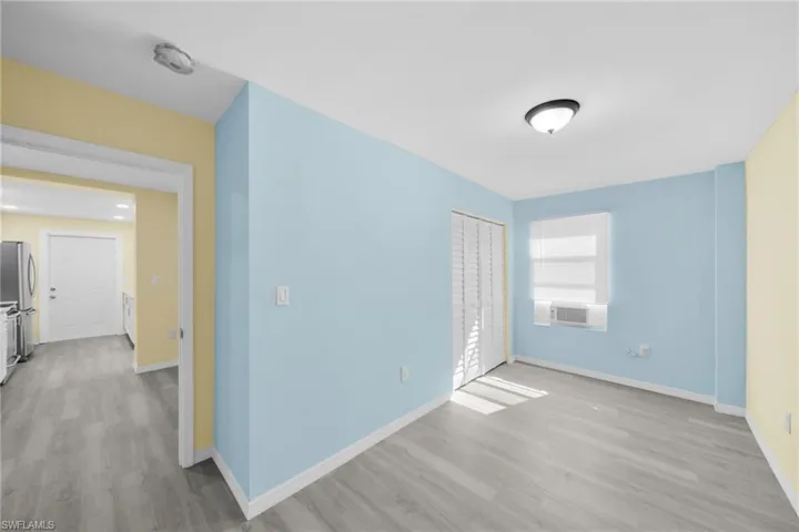 Empty room with light wood-style flooring