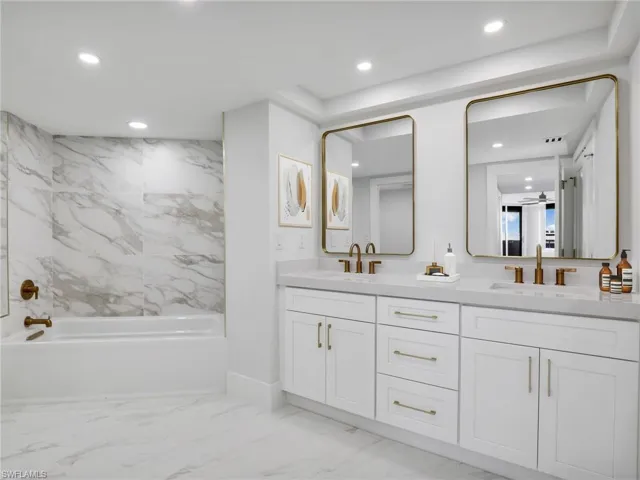3" drop granite counters, dual sinks, linen closet, walk-in shower and separate toilet/bidet