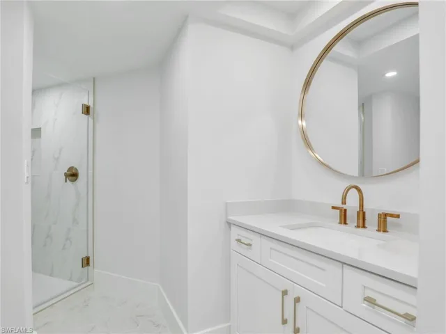 Stunning guest bath 3 remodel with brushed gold fixtures
