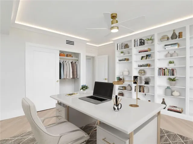 Full bath is right across the hall from this bedroom ready to use as office or bedroom with customized closet.