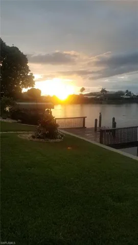 Yard at dusk with a water view