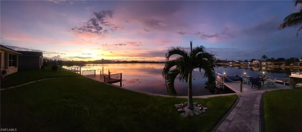Water view featuring a boat dock