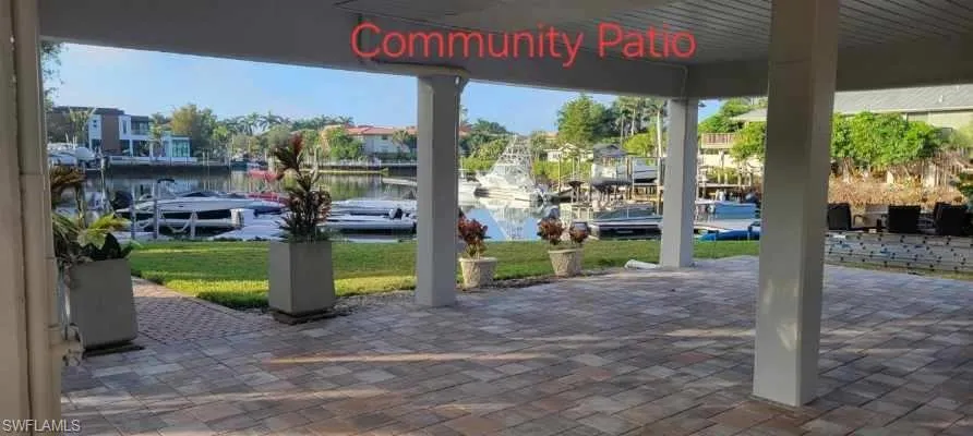 View of community with a water view