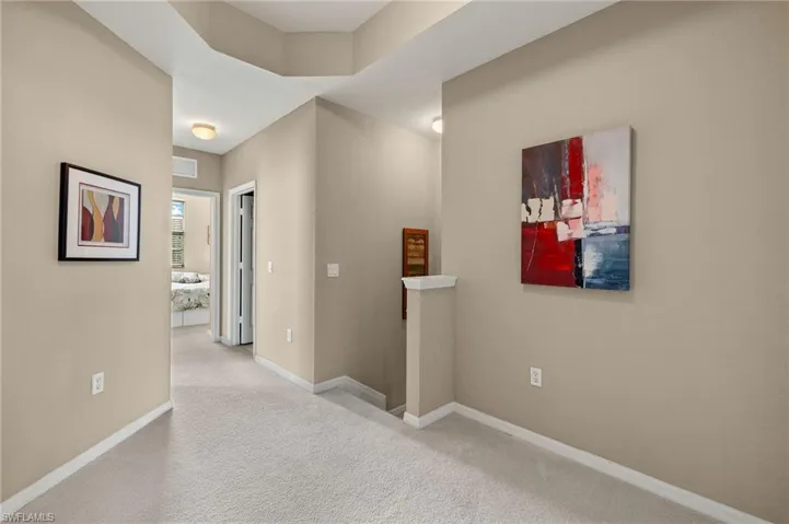 Hall with light carpet