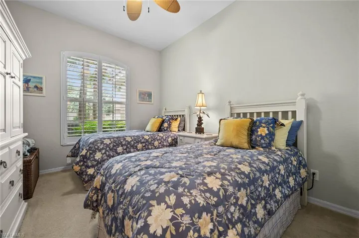 Bedroom featuring carpet flooring and a ceiling fan