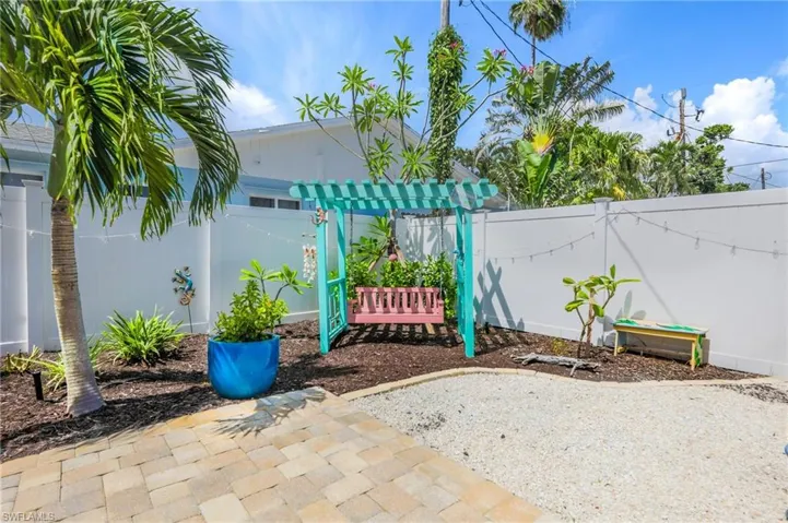 Fenced backyard with a patio area