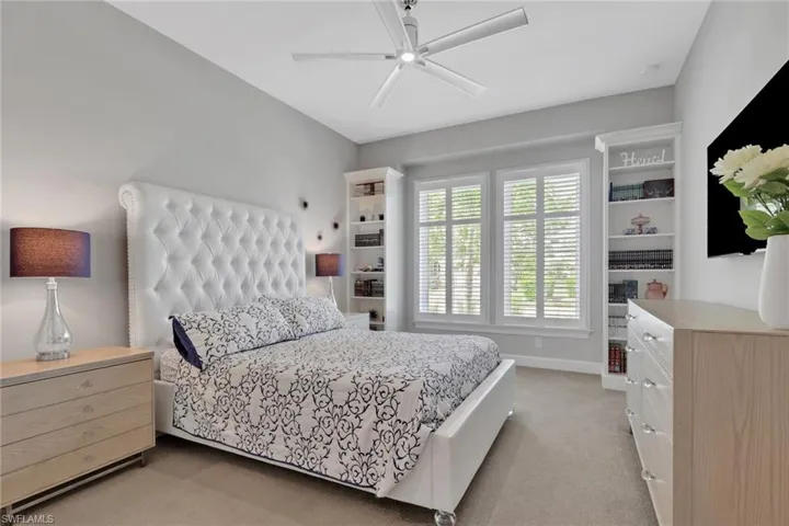 Guest bedroom with built-in bookcases