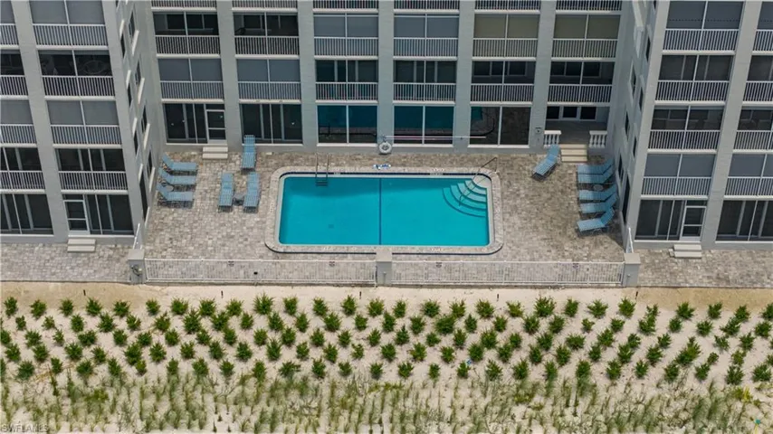 Sparkling beach side pool leads you to the Newly renovated Community Room complete with kitchen, bathrooms, and spacious gathering areas.