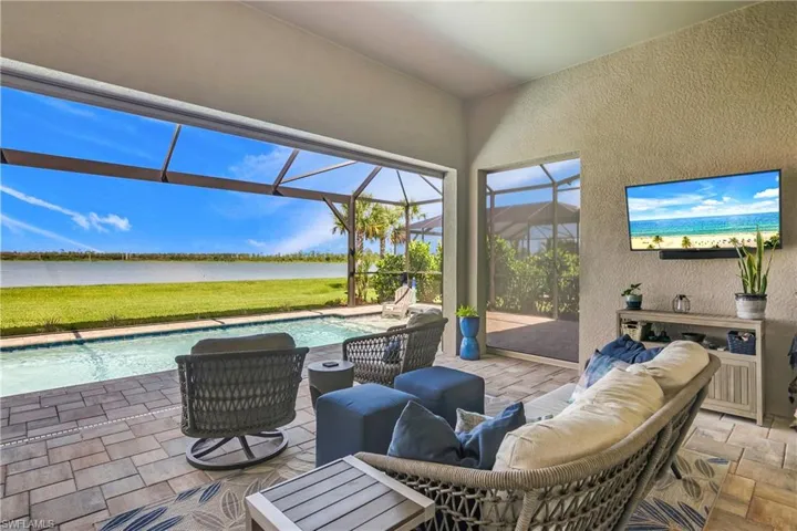 View of patio / terrace with a lanai
