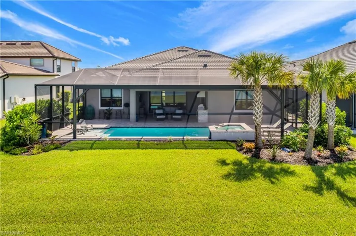 Professionally landscaped oversized lot gives this home great curb appeal.
