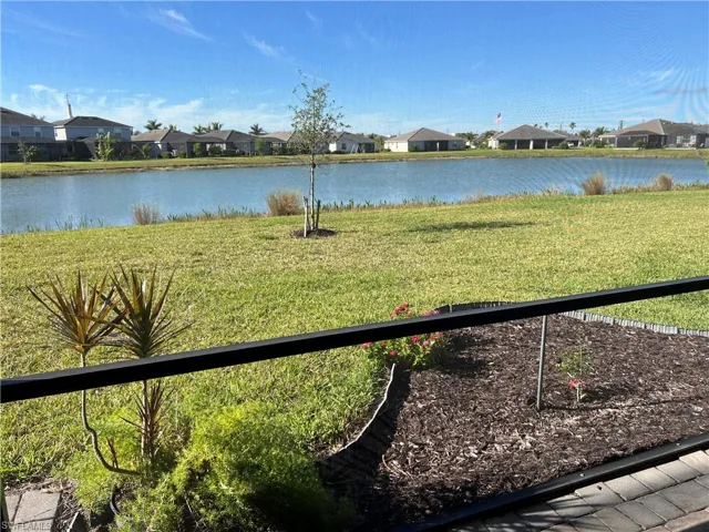 Water view featuring nearby suburban area