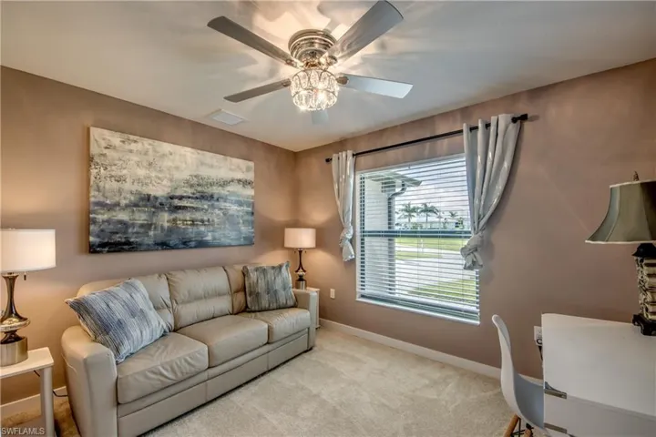 Full bathroom featuring double vanity, curtained shower, and tile patterned floors