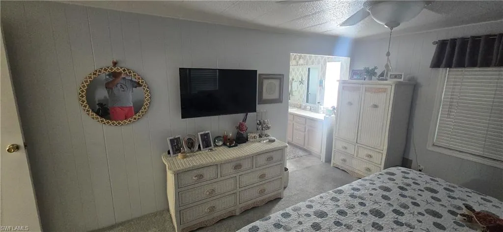 Bedroom with paneling detail