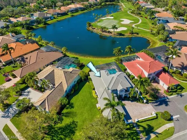 Aerial from front of house to lake and golf course beyond