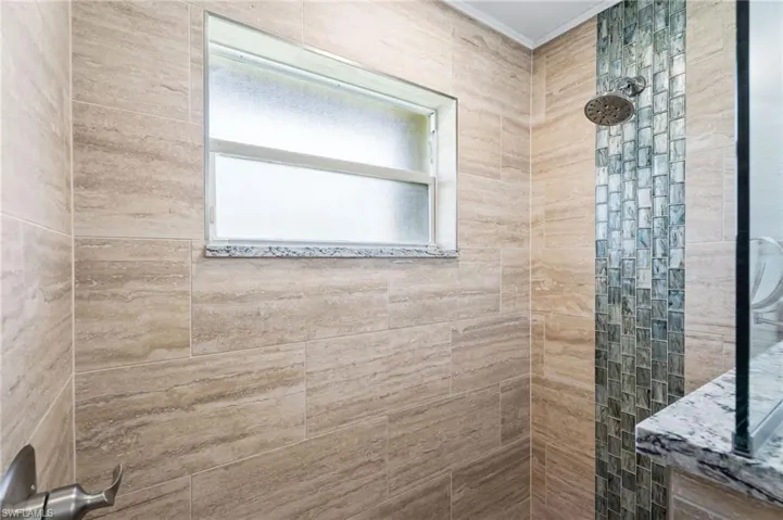Bathroom with a walk in shower