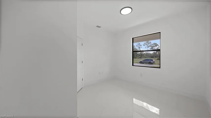 Empty room with baseboards
