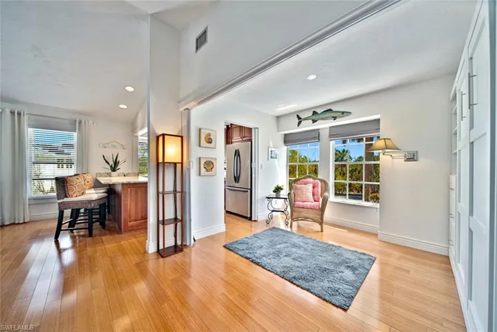 Den features pocket doors to close off space