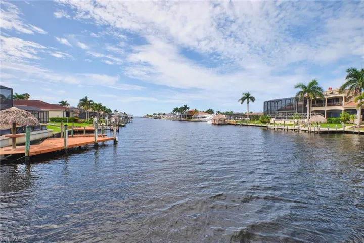 Dock area featuring a water view and a residential view