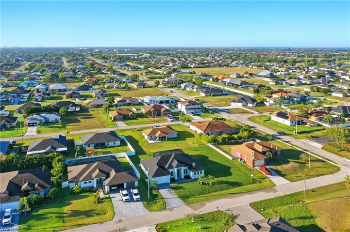 Big yard lot is 130 ft wide x 125 ft deep