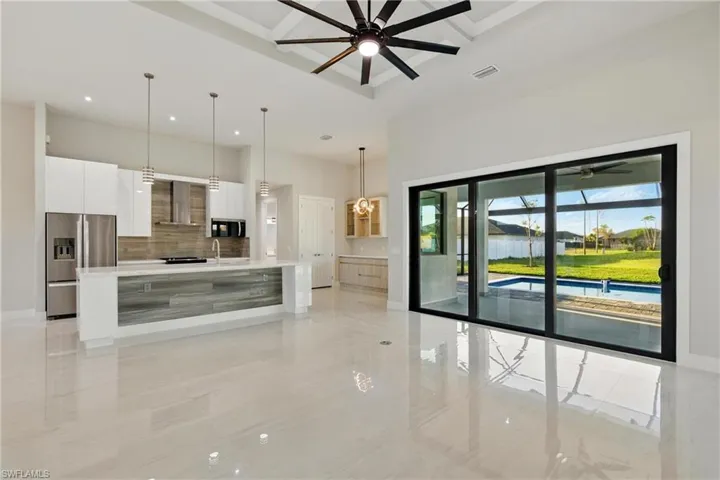 Kitchen, sliding doors to lanai/poool area