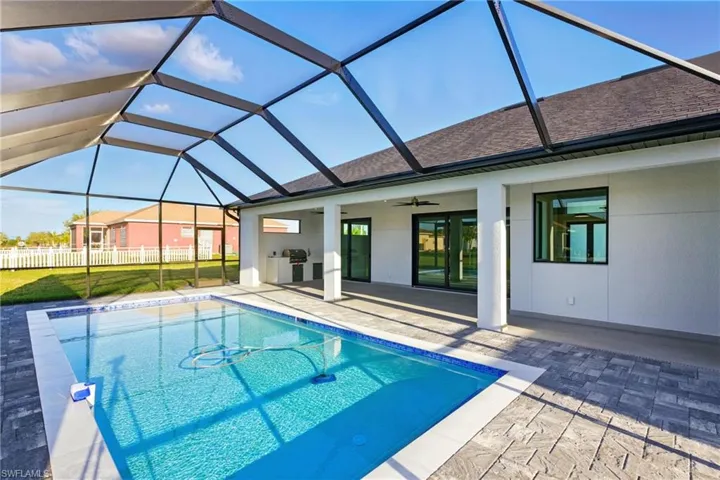 Southern exposure pool approximately 14'x28' with sun deck and bubblers