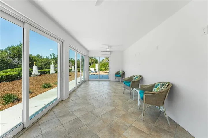 A temperature-controlled enclosed living area extends the home’s usable space year-round.