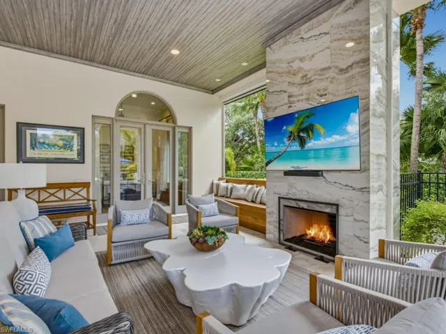 Spacious covered lanai with gas fireplace