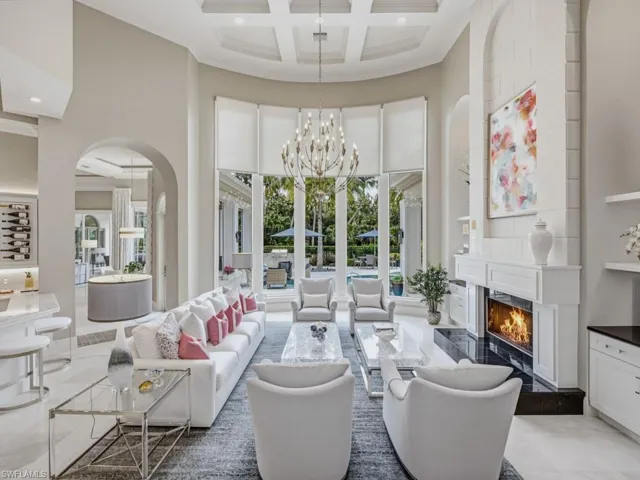Two story living room with coffered ceiling