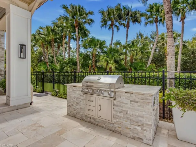 Built in grill and recently repaved patio