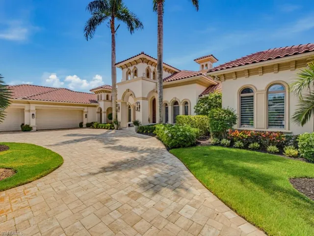 Circular driveway and 3 car garage
