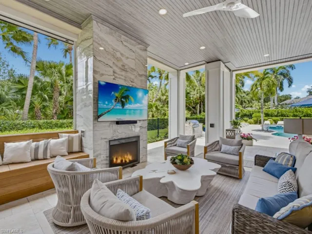 Spacious lanai leading to pool and patio