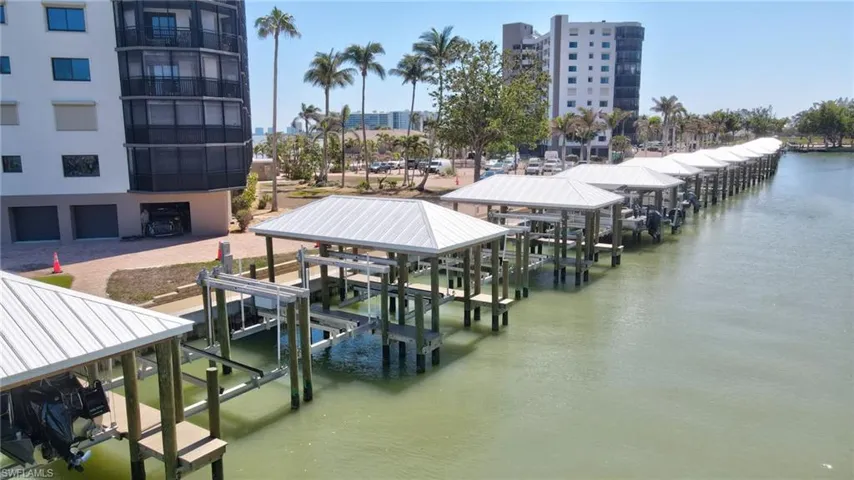 Dock with a water view and boat lift