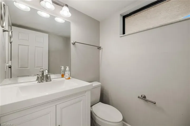Bathroom featuring toilet and vanity
