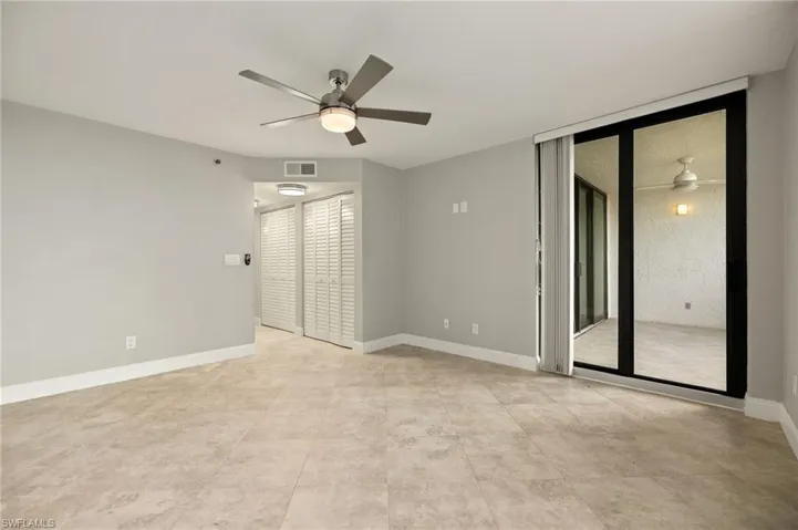 Unfurnished room featuring ceiling fan