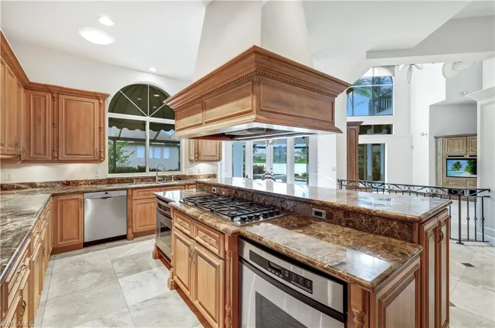 6 burner gas stove. Marble countertops, 2 ovens.