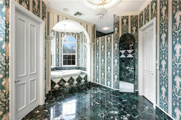 Walk in shower and separate soaking tub.