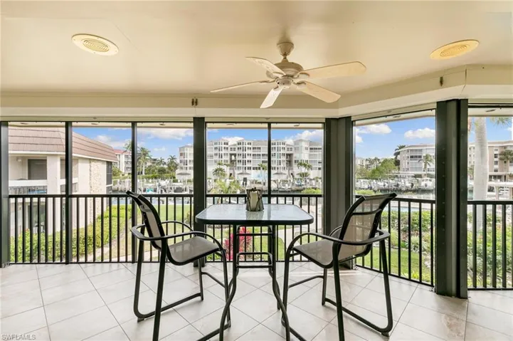 Spacious screened lanai with electric hurricane shutters
