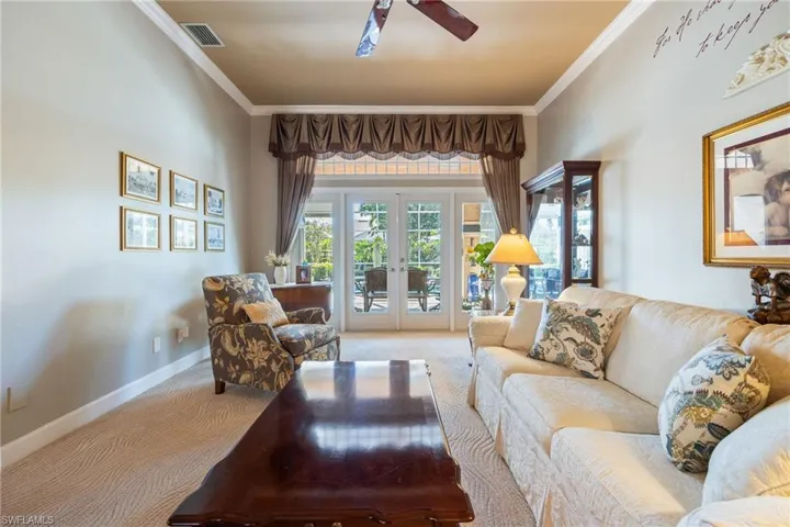Livingroom with glass doors to Lanai