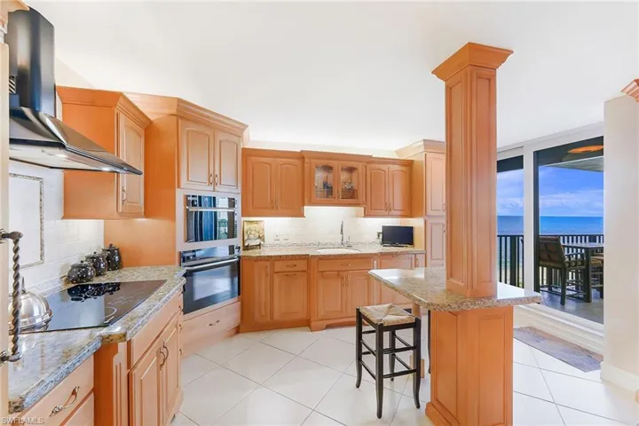 Kitchen with sliders to balcony