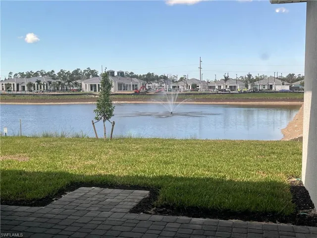Beautiful backyard living space with stunning water view