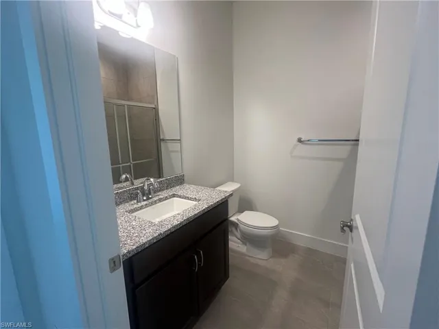 Guest bathroom with full-length shower
