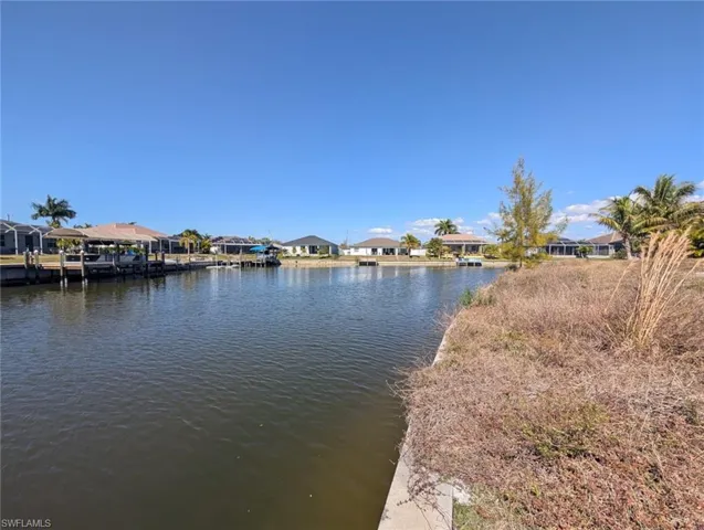 Water view with nearby suburban area