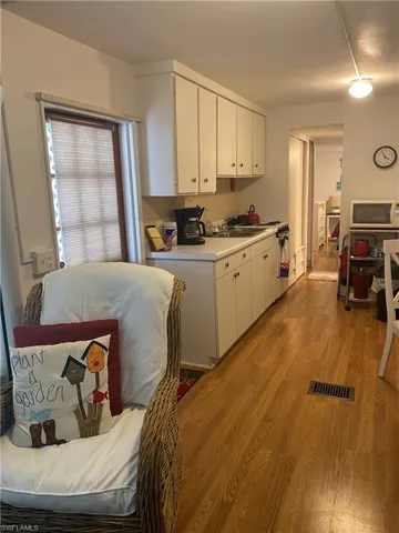 laminate flooring and white cabinets