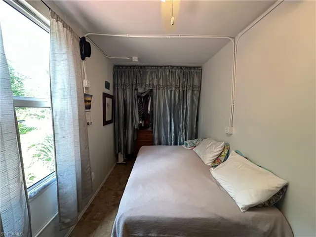 Bedroom with baseboards