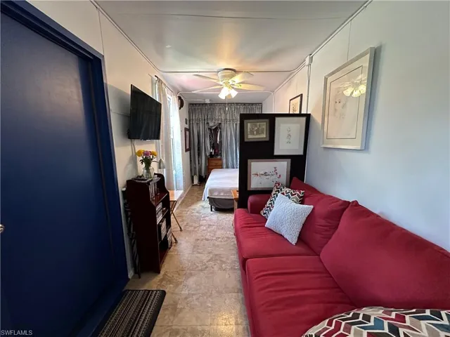 Bedroom featuring a ceiling fan