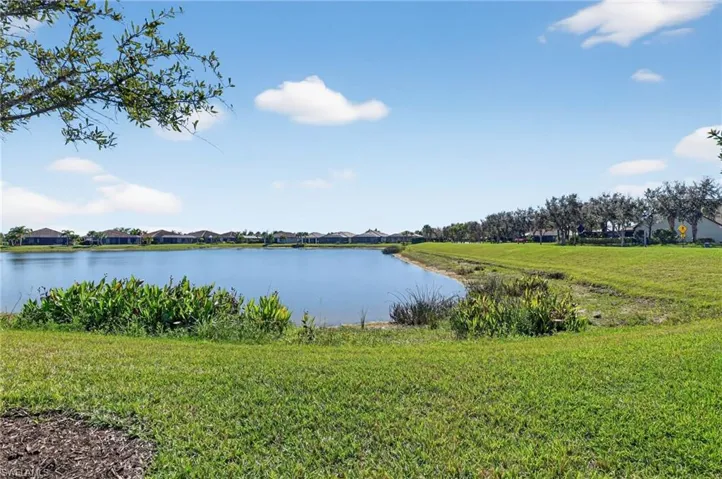 Water view featuring nearby suburban area