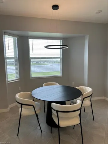 Dining room featuring stunning view.